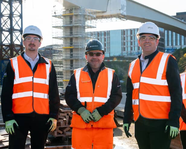 OPUS project engineer Jack Teasdale, with Darren Jones, works manager at VolkerStevin; OPUS managing director Gavin Richardson and management apprentice Evie Richardson at the site of the New Wear Footbridge.