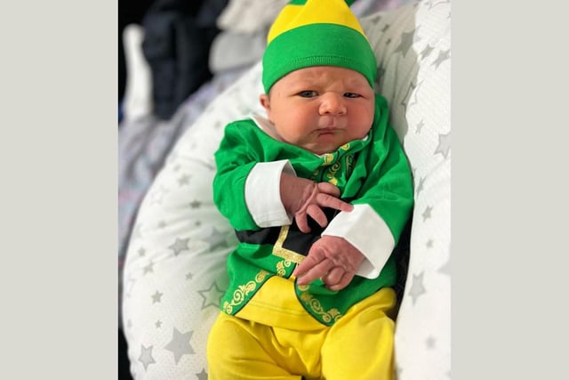 Chester, 1 week old, ready to celebrate his first Christmas.