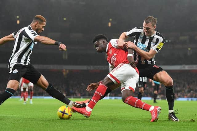 Dermot Gallagher believes Dan Burn was 'lucky' to not concede a penalty against Arsenal (Photo by Stuart MacFarlane/Arsenal FC via Getty Images)