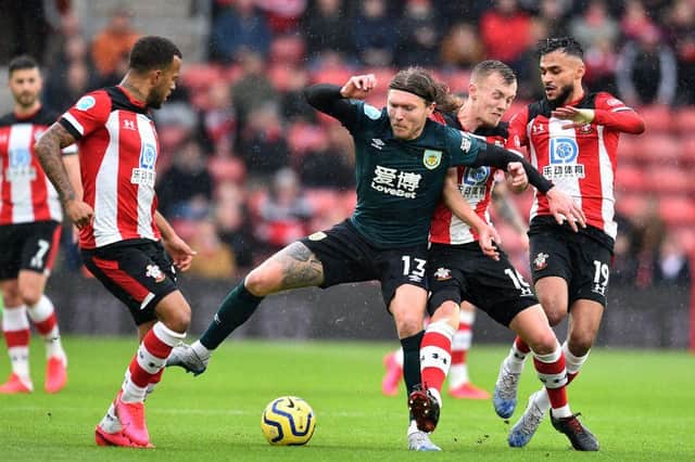 Burnley's Irish midfielder Jeff Hendrick (C) controls the ball during the English Premier League football match between Southampton and Burnley at St Mary's Stadium in Southampton, southern England on February 15, 2020.