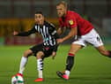 Newcastle United's Paraguayan midfielder Miguel Almiron (L) vies with Morecambe's English defender Harry Davis (R) during the English League Cup third round football match between Morecambe and Newcastle United at The Mazuma Stadium in north-west England, on September 23, 2020.