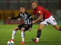 Newcastle United's Paraguayan midfielder Miguel Almiron (L) vies with Morecambe's English defender Harry Davis (R) during the English League Cup third round football match between Morecambe and Newcastle United at The Mazuma Stadium in north-west England, on September 23, 2020.