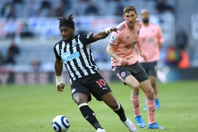 Allan Saint-Maximin of Newcastle United controls the ball during the Premier League match between Newcastle United and Sheffield United at St. James Park on May 19, 2021 in Newcastle upon Tyne, England.