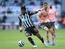 Allan Saint-Maximin of Newcastle United controls the ball during the Premier League match between Newcastle United and Sheffield United at St. James Park on May 19, 2021 in Newcastle upon Tyne, England.