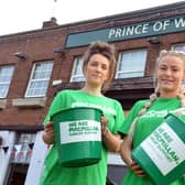 Prince of Wales is to hold a Macmillan fundraising fun day. From left Abi Laidler and assistant manager Natasha Bell.