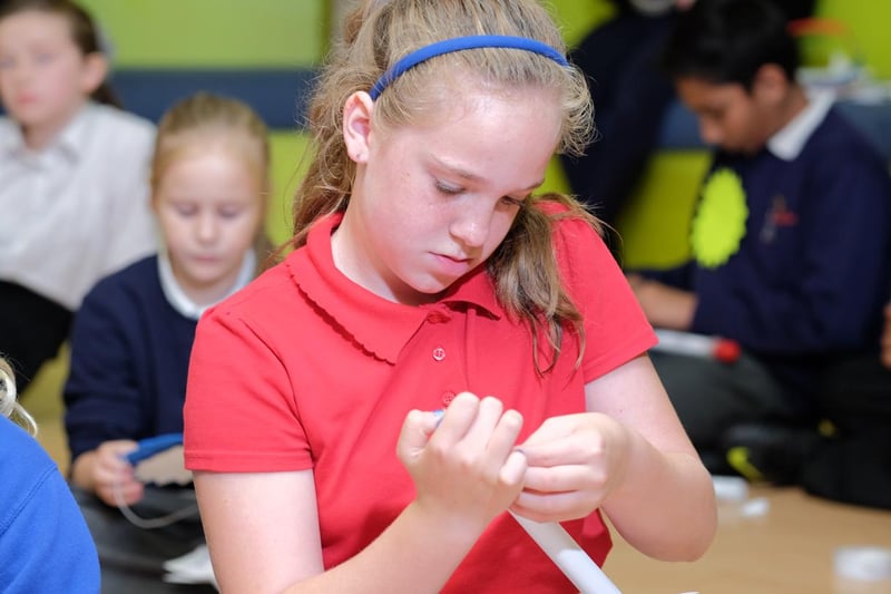 A student concentrates on her project during the visit of Britain's first female astronaut, Helen Sharman, to High Tunstall College of Science.