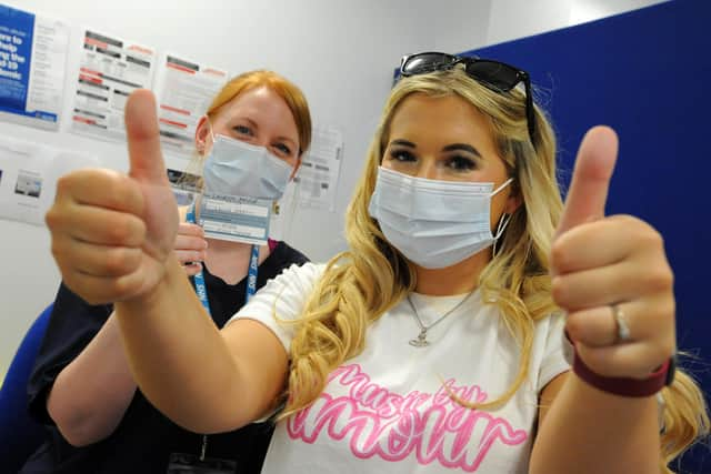 Lauren Amour with vaccinator Emma Dixon at Cleadon Park Primary Care Centre in South Shields.