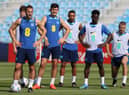 England captain Harry Kane (l) alongside John Stones, Harry Maguire , Callum Wilson, Bukayo Sako and Eric Dier during the England Press Conference at Al Wakrah Stadium on November 17, 2022 in Doha, Qatar. (Photo by Michael Steele/Getty Images)