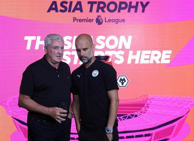 Steve Bruce and Pep Guardiola in China.