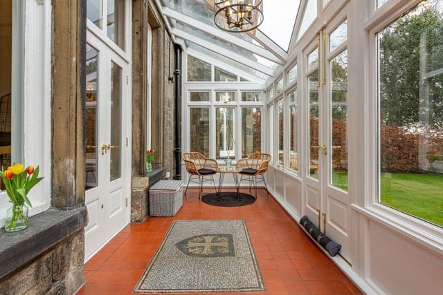 A set of double doors lead to an ‘Orangery’ re-instated while retaining the original tiled floor which in turn leads to the enclosed front lawn.