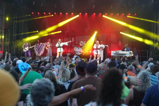 Abba Revival perform to the crowd at Tribfest 2024. They are appearing again this year. Pic Dave Lofthouse