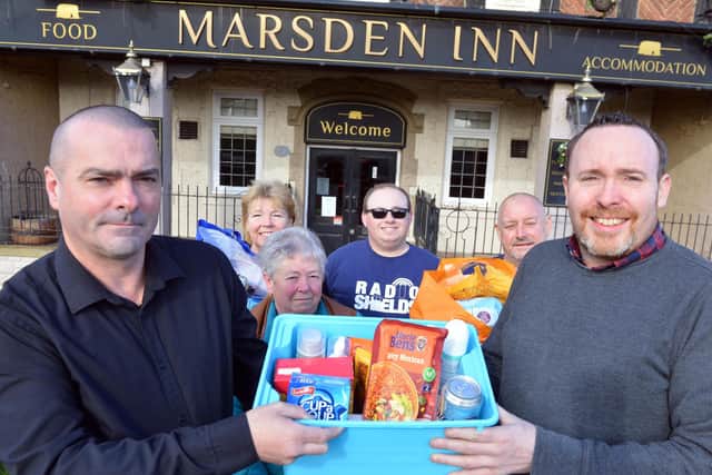 Marsden Inn landlord Michael Ward and South Shields Community Warriors.