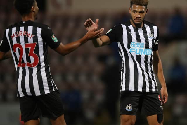 Joelinton celebrates a goal against Morecambe.