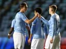 Callum Doyle (left) celebrates with teammate Liam Delap (right)