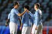 Callum Doyle (left) celebrates with teammate Liam Delap (right)