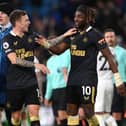 Allan Saint-Maximin of Newcastle and Kieran Trippier (l) celebrate after the Premier League match between Leeds United  and  Newcastle United at Elland Road on January 22, 2022 in Leeds, England. (Photo by Stu Forster/Getty Images)