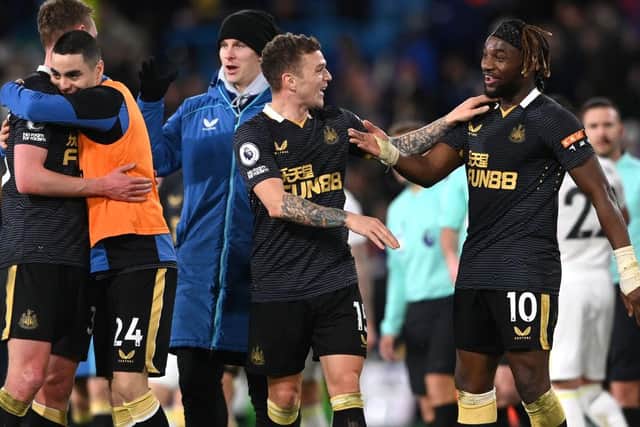 Allan Saint-Maximin of Newcastle and Kieran Trippier (l) celebrate after the Premier League match between Leeds United and Newcastle United at Elland Road on January 22, 2022 in Leeds, England. (Photo by Stu Forster/Getty Images)