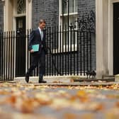 Chancellor of the Exchequer Jeremy Hunt departs Downing Street to present the Autumn Statement to the House of Commons.