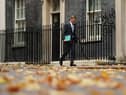 Chancellor of the Exchequer Jeremy Hunt departs Downing Street to present the Autumn Statement to the House of Commons.