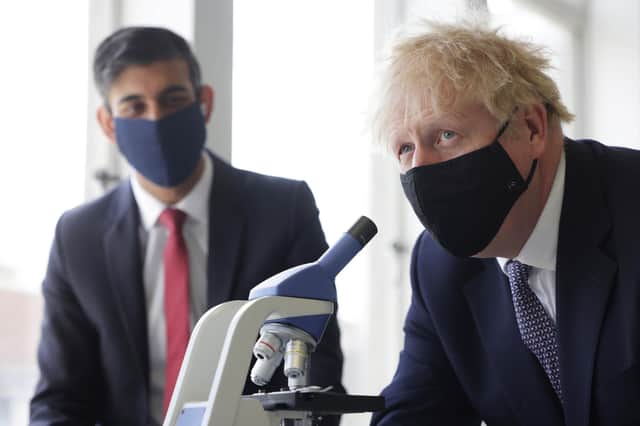 Prime Minister Boris Johnson (right) and Chancellor of the Exchequer Rishi Sunak