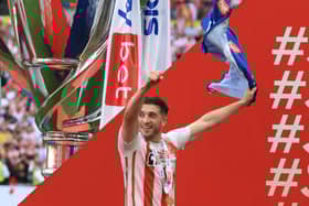 Lynden Gooch celebrates after winning promotion with Sunderland.