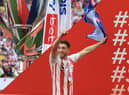 Lynden Gooch celebrates after winning promotion with Sunderland.