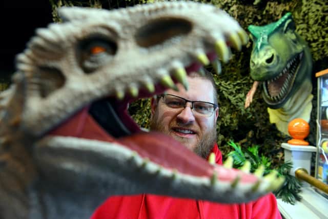 The opening of the Dino Den dinosaur shop is a "dream come true" for owner Andrew Garthwaite.
