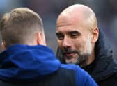 Newcastle manager Eddie Howe chats with Pep Guardiola before the Premier League match between Newcastle United  and  Manchester City at St. James Park on December 19, 2021 in Newcastle upon Tyne, England. (Photo by Stu Forster/Getty Images)