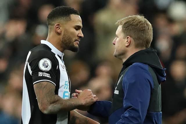 Newcastle United manager Eddie Howe celebrates at full time with captain Jamaal Lascelles during the Premier League match between Newcastle United and Burnley at St. James Park on December 04, 2021 in Newcastle upon Tyne, England. (Photo by Ian MacNicol/Getty Images)