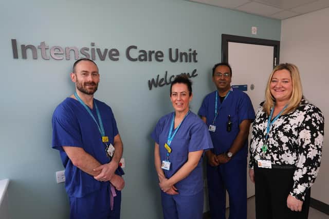 Dr Pete Hersey, unit manager Julie Sheriff, Dr Sanjay Deshpande and Sue Askew, Theatres Directorate Manager in the reception area of the new ICU.