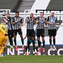Gareth Bale taking a free-kick against Newcastle United (Photo by Stu Forster/Getty Images)