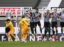 Gareth Bale taking a free-kick against Newcastle United (Photo by Stu Forster/Getty Images)