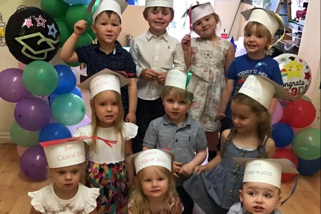 Children at Nurserytime Kindergarten celebrate the start of a new chapter.