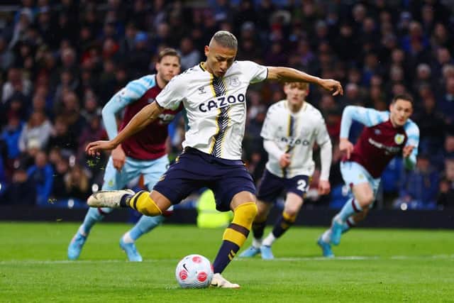 Richarlison of Everton scores their team's first goal from the penalty spot during the Premier League match between Burnley and Everton at Turf Moor on April 06, 2022 in Burnley, England. (Photo by Clive Brunskill/Getty Images)