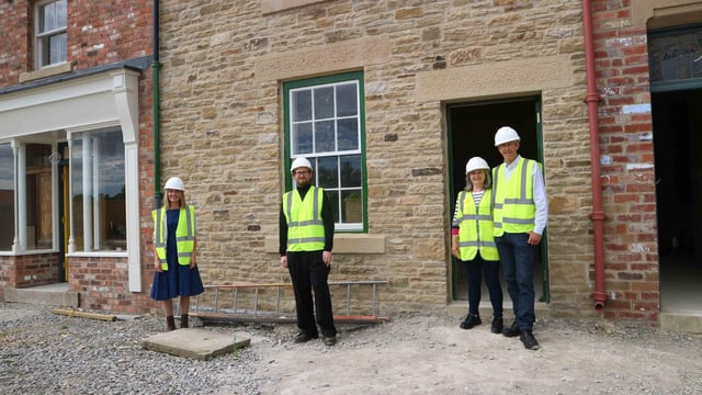 From left: Lisa Kaimenas and Connor Emerson of Beamish Museum with Dorothy and John Cornish in front of No. 2 Front Street terrace.