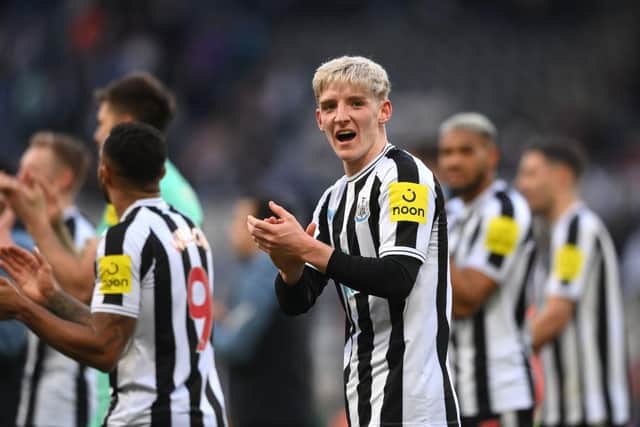 Newcastle player Anthony Gordon applauds the fans after the Premier League match between Newcastle United and Manchester United at St. James Park on April 02, 2023 in Newcastle upon Tyne, England. (Photo by Stu Forster/Getty Images)