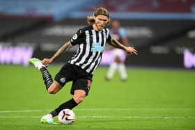 Newcastle United's Irish midfielder Jeff Hendrick shoots to score their second goal during the English Premier League football match between West Ham United and Newcastle United at The London Stadium, in east London on September 12, 2020.
