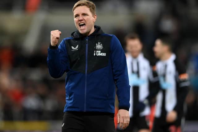 Eddie Howe celebrates at the final whistle.