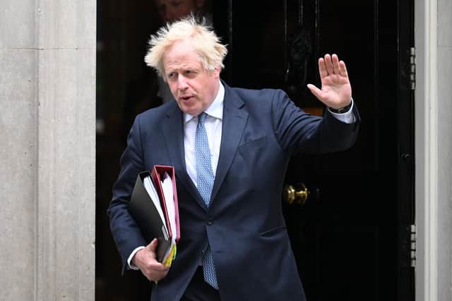 Prime Minister Boris Johnson departs 10 Downing Street for PMQs, his first since the Sue Gray Report into "Partygate" was made public. Photo by Leon Neal/Getty Images