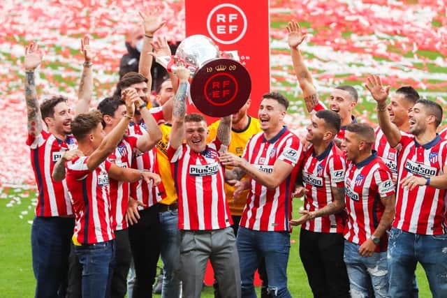 MKieran Trippier of Atletico de Madrid celebrates with La Liga trophy during the trophy presentation at Estadio Wanda Metropolitano on May 23, 2021 in Madrid, Spain. (Photo by Angel Martinez/Getty Images)