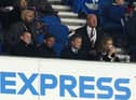 Eddie Howe with Newcastle United co-owner Amanda Staveley at the Amex Stadium.