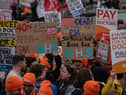 Junior doctors take part in a rally in Trafalgar Square during a nationwide strike on April 11, 2023 in London. Junior doctors in England are held a 96-hour walkout hoping to achieve full pay restoration after seeing their pay cut by more than a quarter since 2008. (Photo by Carl Court/Getty Images)