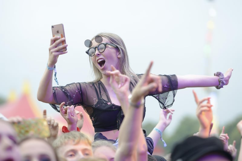 A fan poses for a selfie as Circa Waves from Liverpool play the main stage in Hillsborough Park for Tramlines 2019