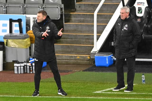 NEWCASTLE UPON TYNE, ENGLAND - FEBRUARY 02: Graeme Jones, Coach of Newcastle United gives their team instructions during the Premier League match between Newcastle United and Crystal Palace at St. James Park on February 02, 2021 in Newcastle upon Tyne, England. Sporting stadiums around the UK remain under strict restrictions due to the Coronavirus Pandemic as Government social distancing laws prohibit fans inside venues resulting in games being played behind closed doors. (Photo by Stu Forster/Getty Images)