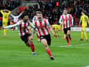 Sunderland midfielder Max Power celebrates his last-gasp equaliser against Fleetwood Town.