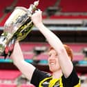 Hebburn Town's Michael Richardson celebrates with lifting the Buildbase FA Vase 2019/20 Trophy after victory in the Final at Wembley Stadium, London. PA picture.