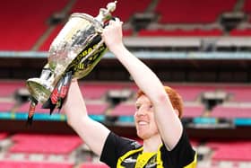 Hebburn Town's Michael Richardson celebrates with lifting the Buildbase FA Vase 2019/20 Trophy after victory in the Final at Wembley Stadium, London. PA picture.