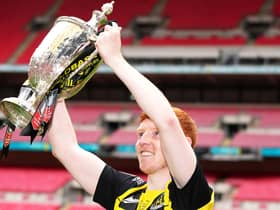 Hebburn Town's Michael Richardson celebrates with lifting the Buildbase FA Vase 2019/20 Trophy after victory in the Final at Wembley Stadium, London. PA picture.