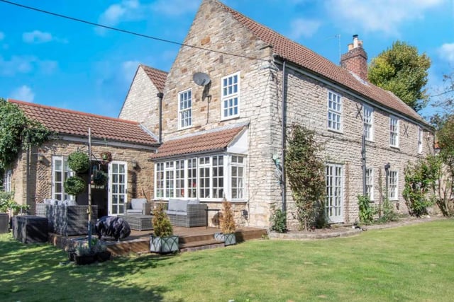 Featuring five bedrooms and two ensuite bathrooms, this property has a price of £700,000.