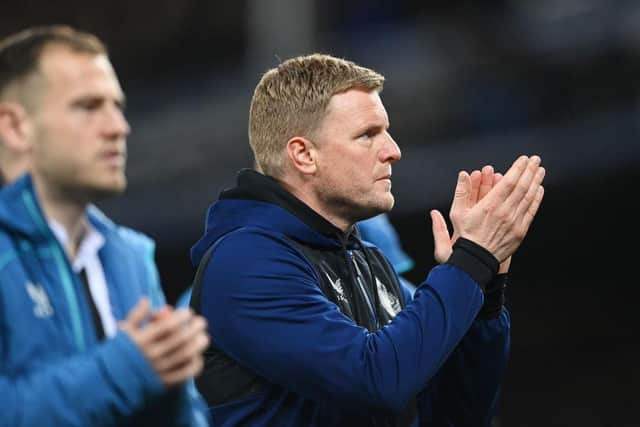 Eddie Howe applauds Newcastle United fans at Goodison Park.